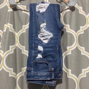 Juniors ripped jeans.